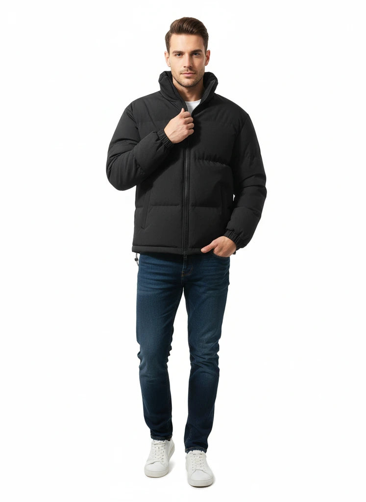 Man wearing a black puffer jacket on a white background
